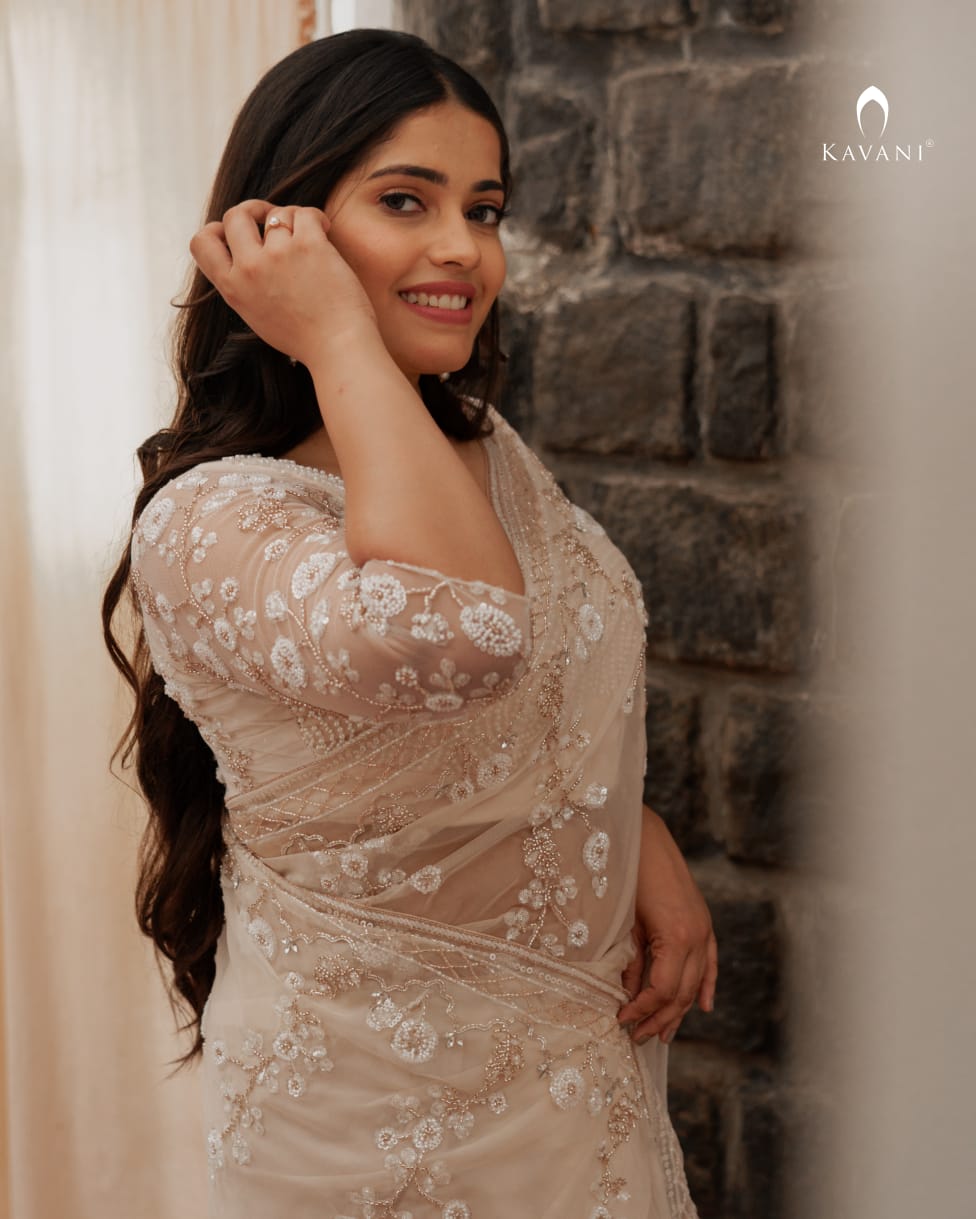 Our signature designer bridal saree with beautiful hand embroidery and a beaded worked blouse