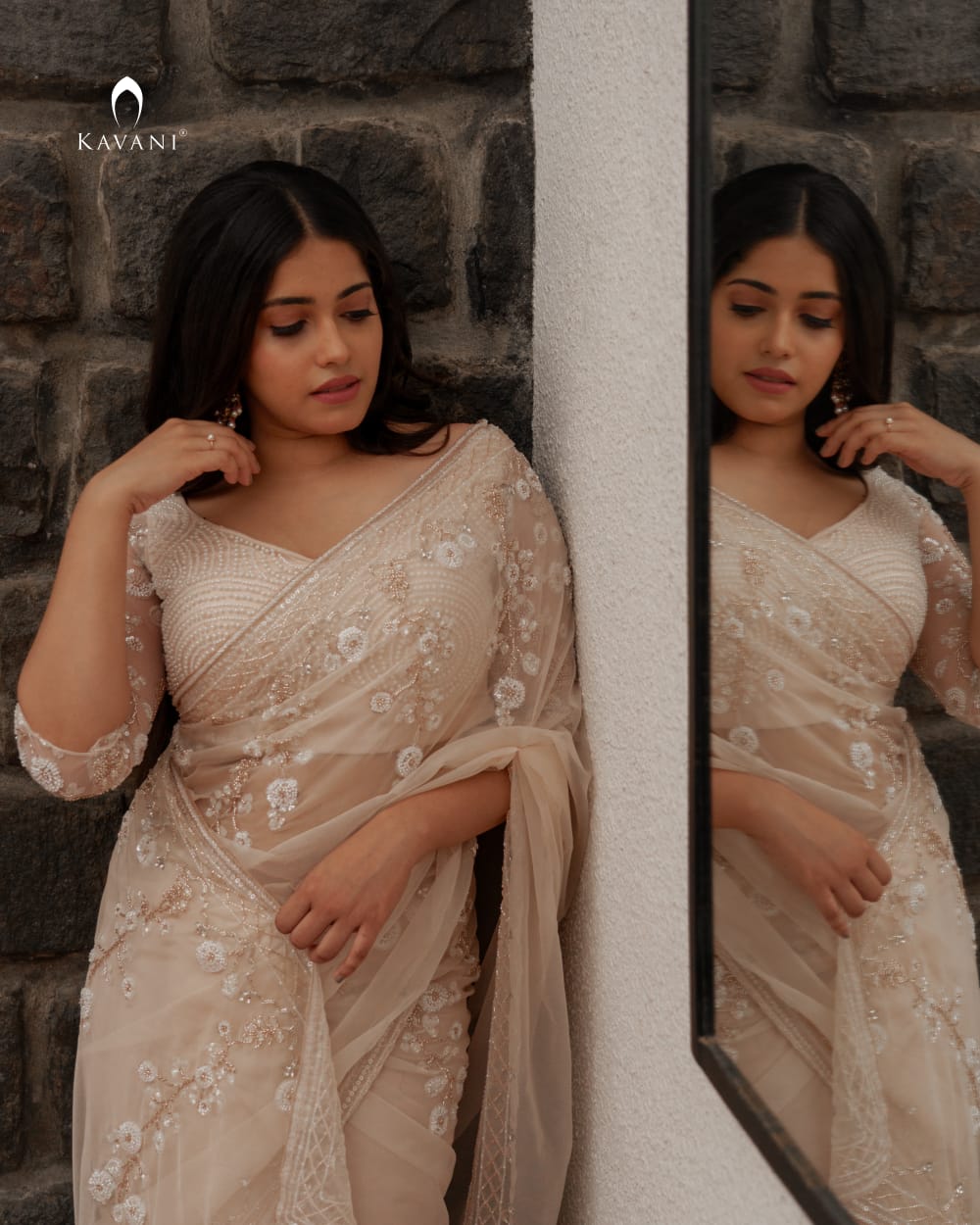 Our signature designer bridal saree with beautiful hand embroidery and a beaded worked blouse