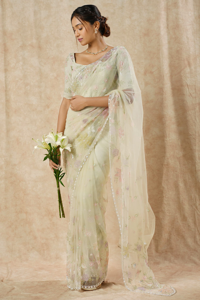 Enchanting Sage Green Net Saree with Multicolor Floral Appliqué & Beaded Detailing