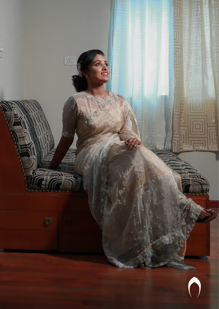 Signature Christian bridal saree in tissue fabric with floral hand embroidery