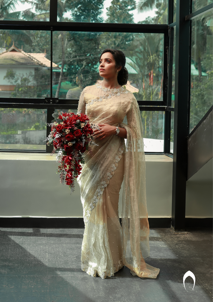 Signature Christian bridal saree in tissue fabric with floral hand embroidery