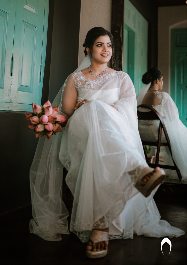 Signature Christian bridal floral hand embroidered organza saree with elegant border work