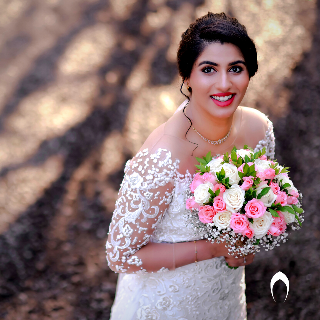 Signature Christian bridal Aline Full Fliar Net gown carried By Bride Mishel