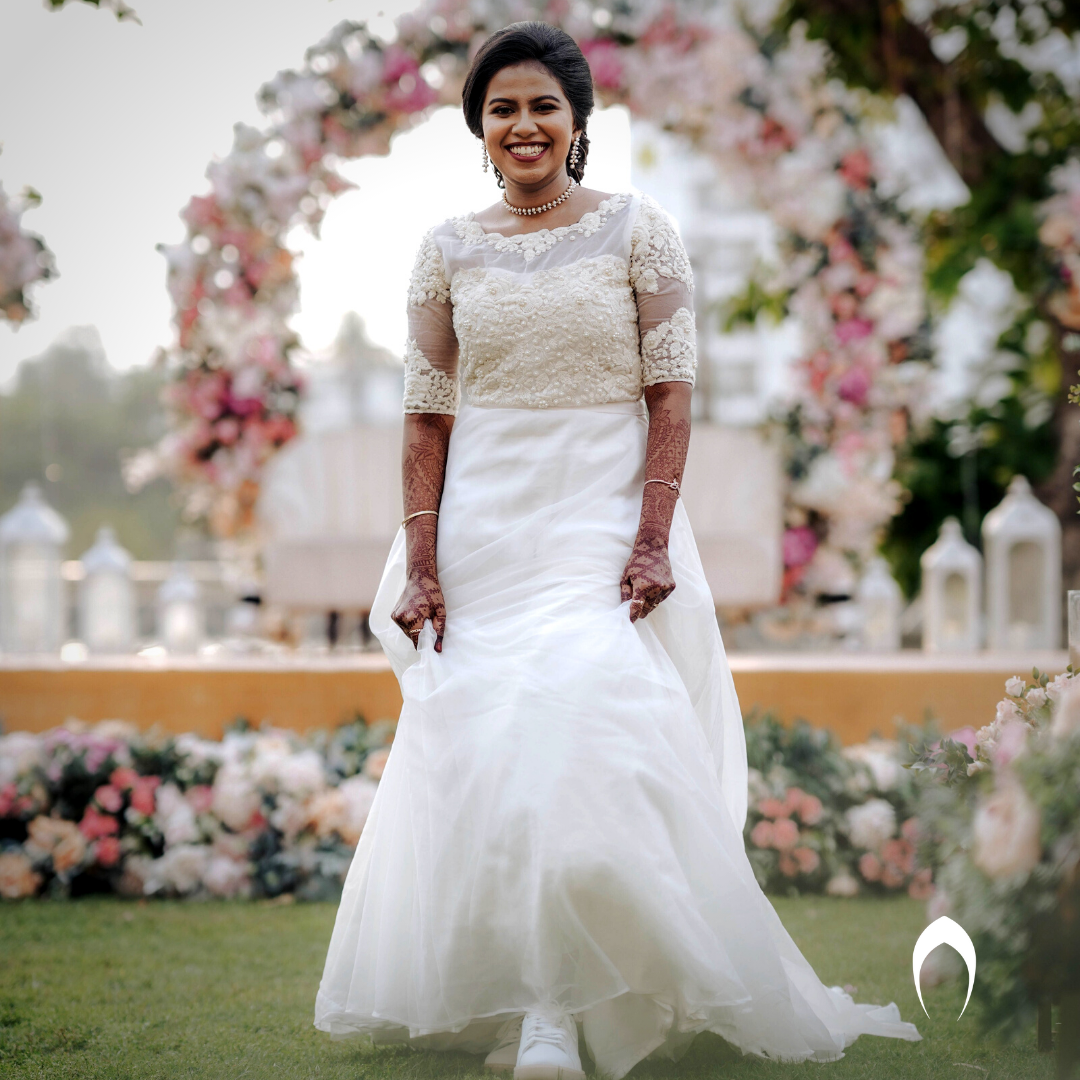 Signature Christian bridal Aline Full Flair gown carried By Bride Nismath