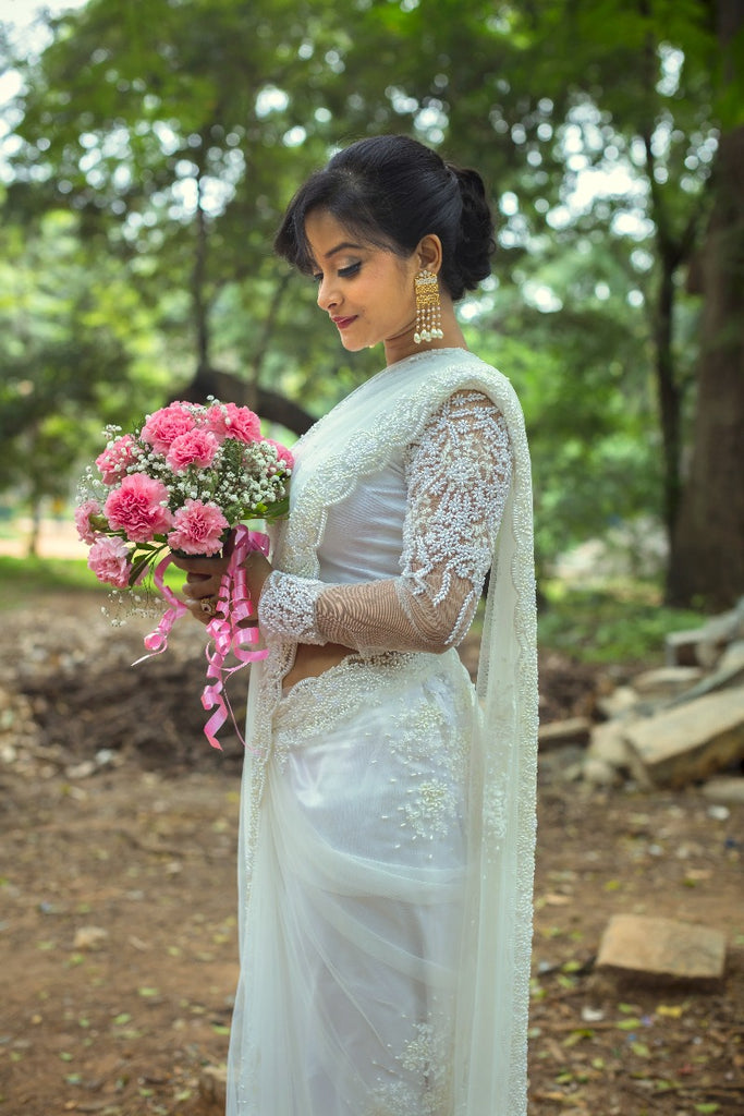 Signature Christian Bridal net saree with with floral embellishments