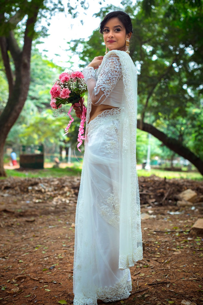 Signature Christian Bridal net saree with with floral embellishments