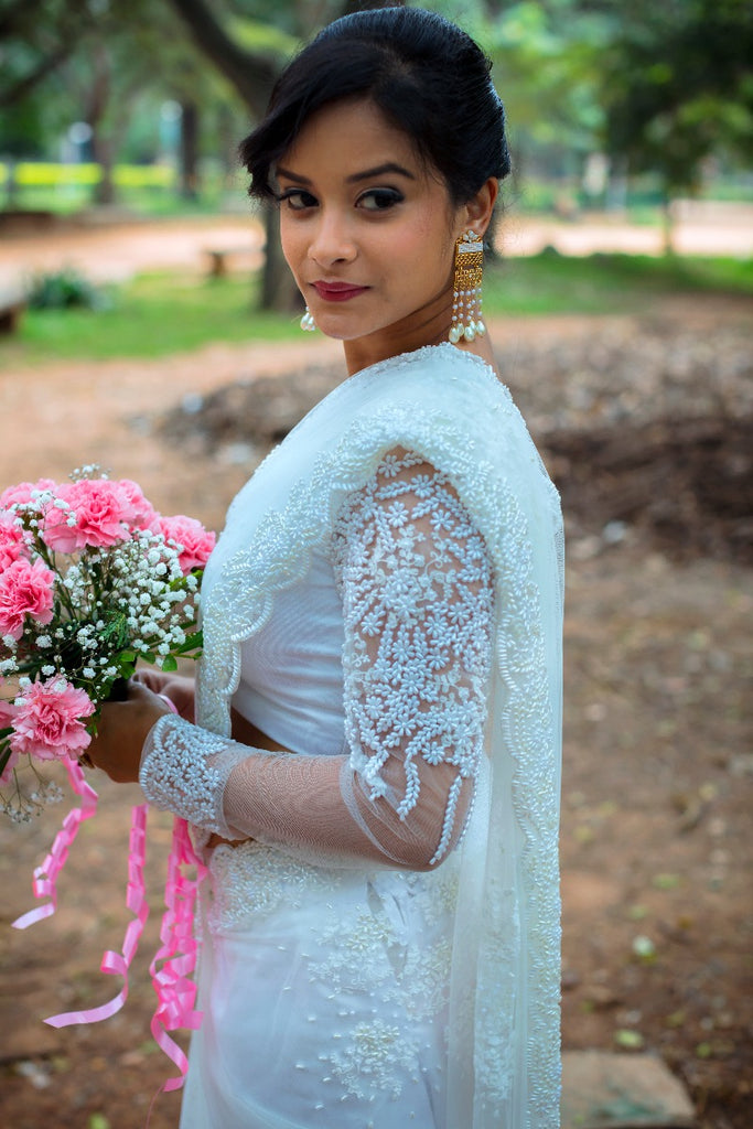 Signature Christian Bridal net saree with with floral embellishments