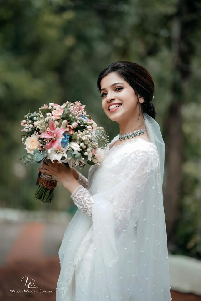 Signature Christian Bridal Saree Handcrafted for Bride Ann Neenu