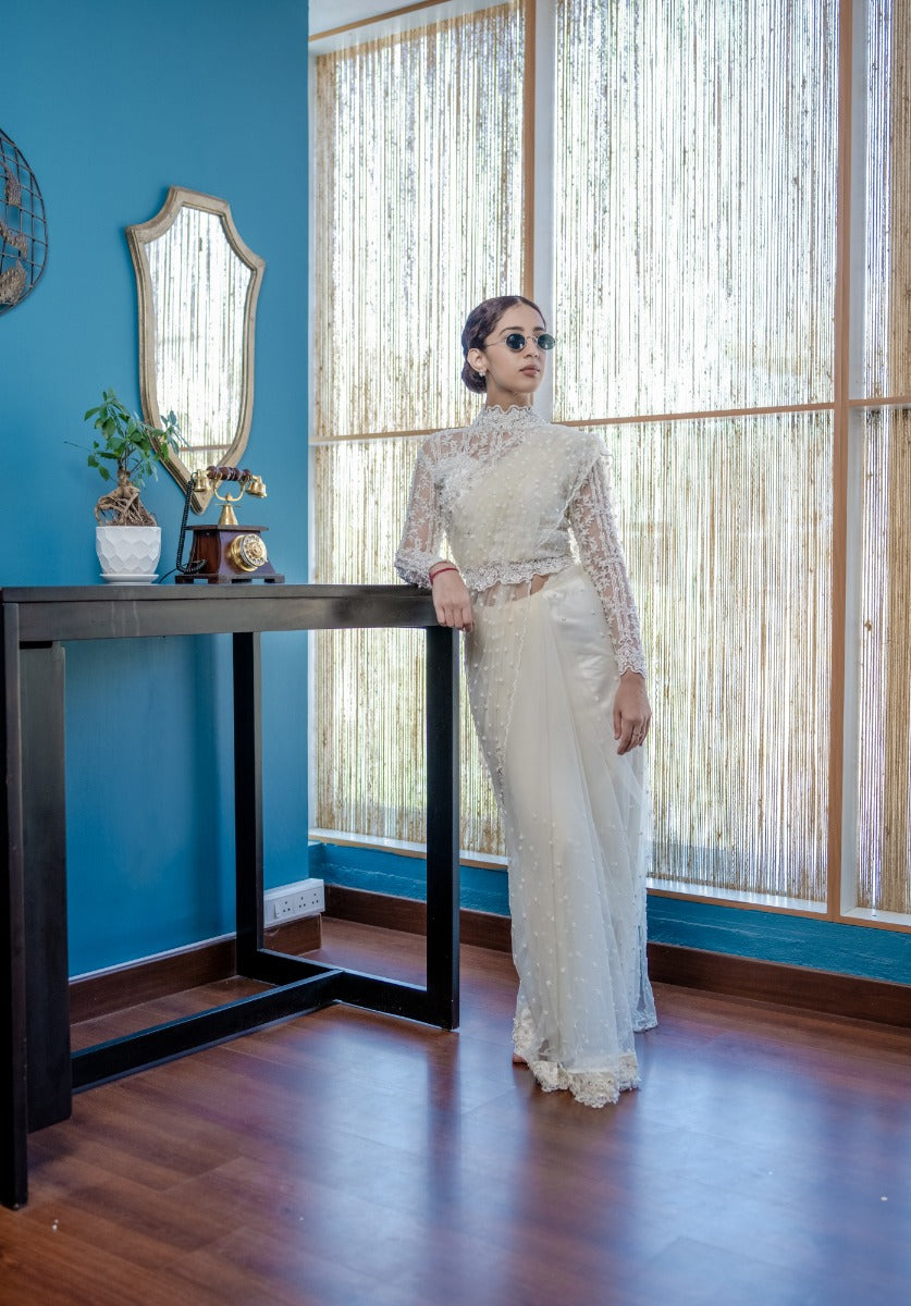 signature Christian bridal Fully hand embroidered Off-white Net saree