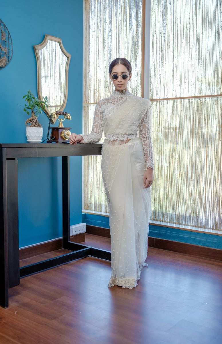 signature Christian bridal Fully hand embroidered Off-white Net saree