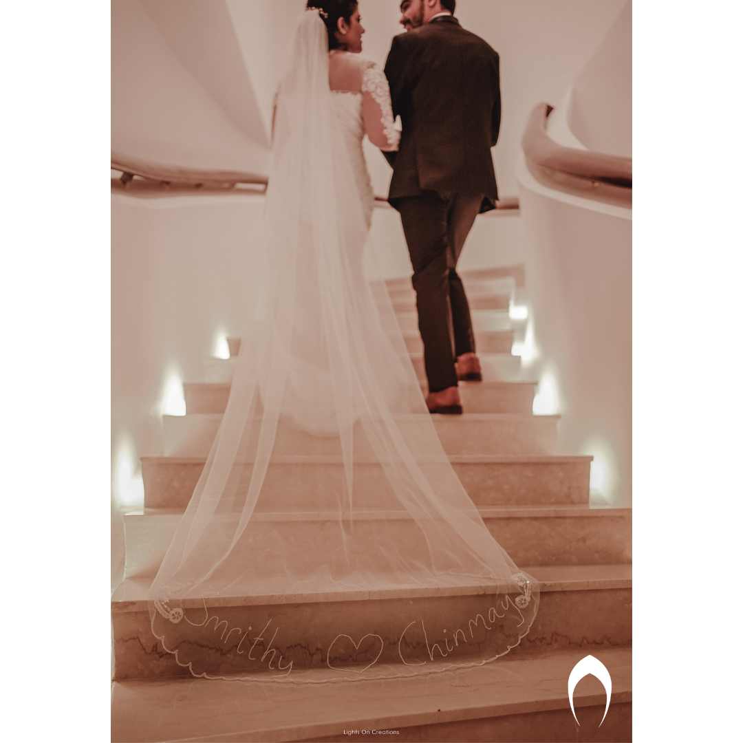 Signature Christian bridal Mermaid Fish Cut Gown In Net carried By Bride Smrithy