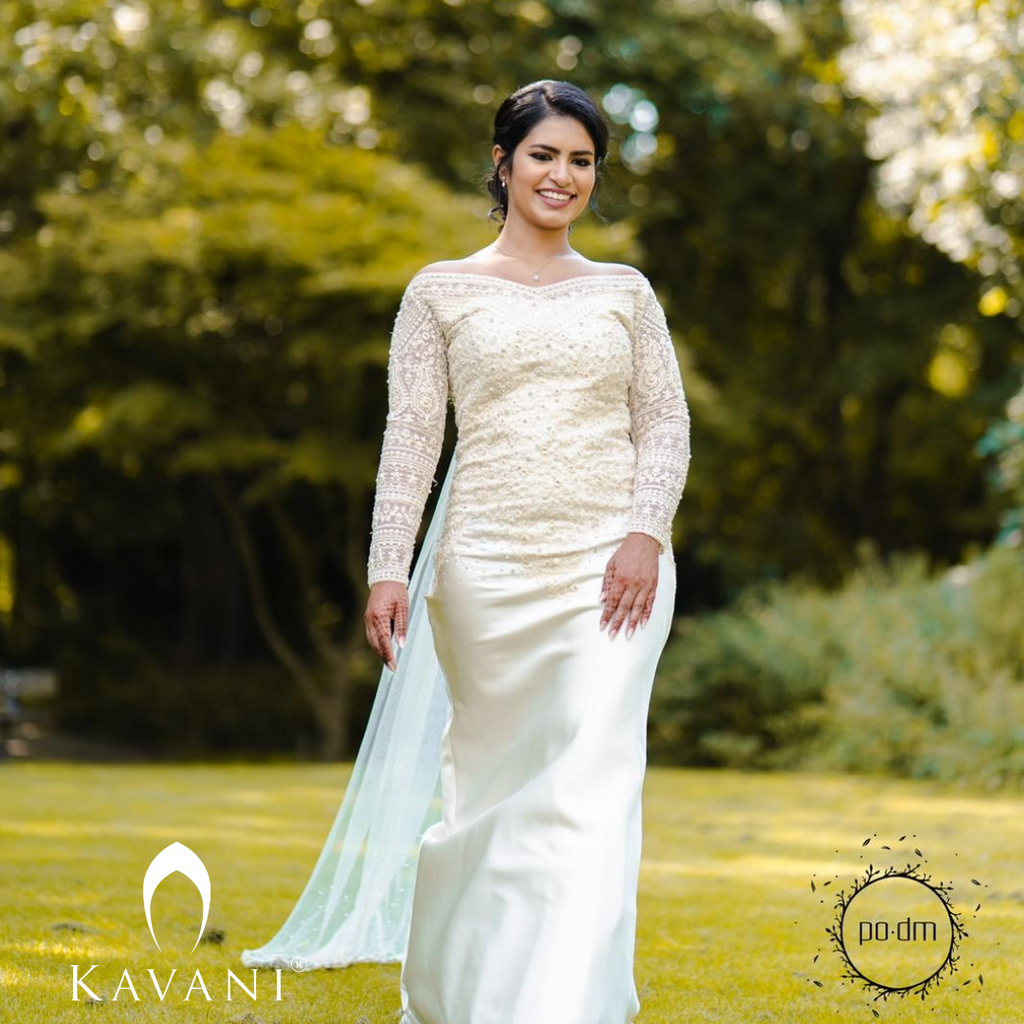Signature Christian bridal Mermaid Fish Cut Gown In Bridal Satin Carried By Bride Irene