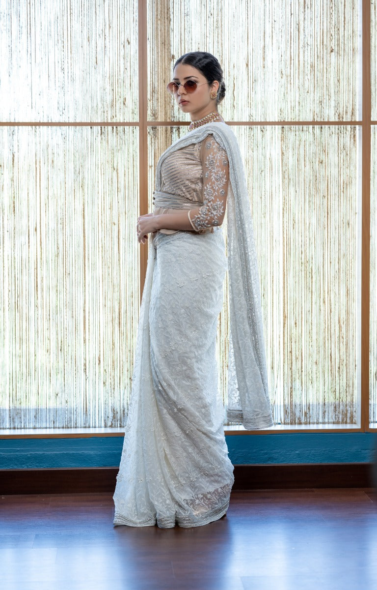 signature Christian bridal Off-white saree with  lace work over georgette