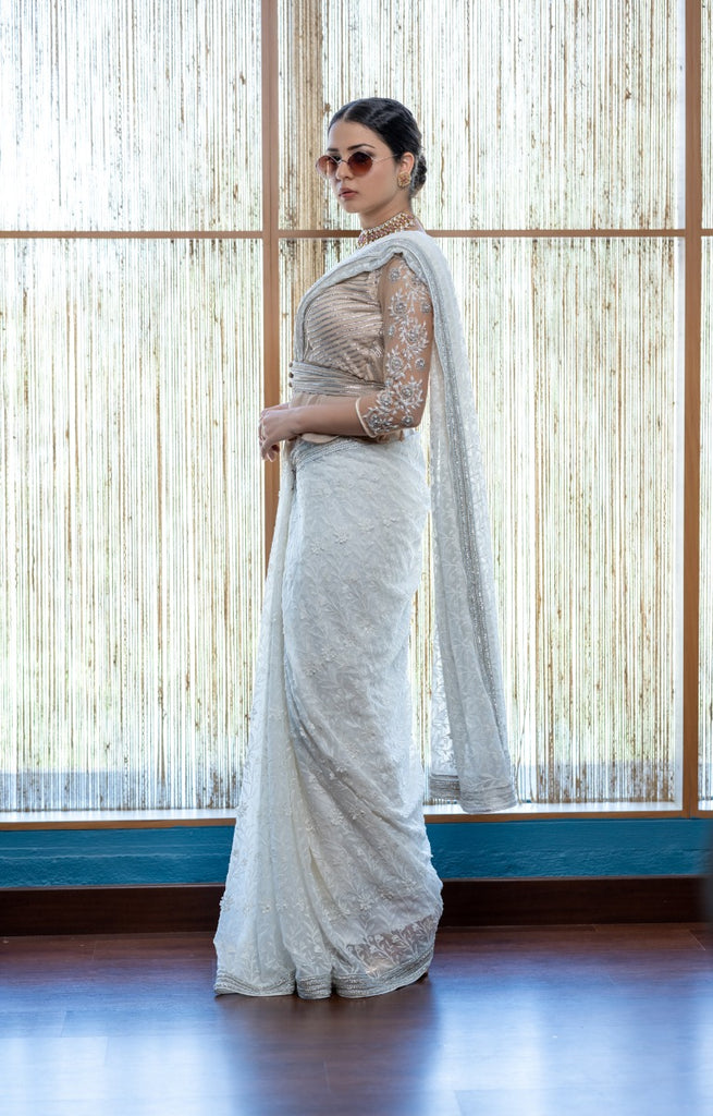 signature Christian bridal Off-white saree with lace work over georgette