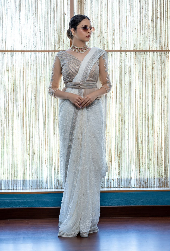 signature Christian bridal Off-white saree with lace work over georgette