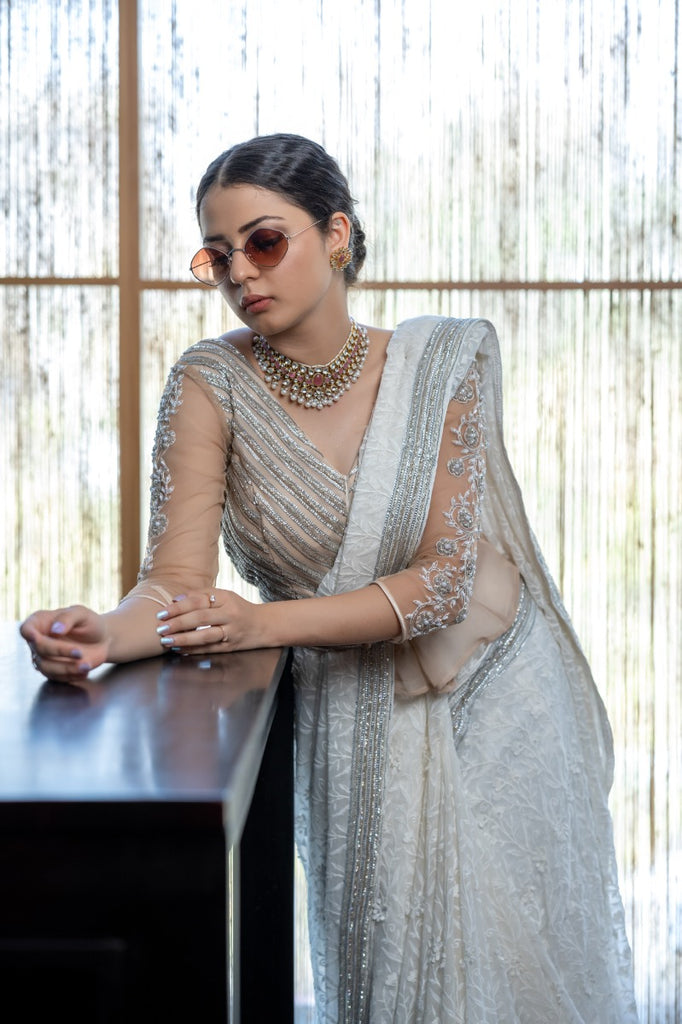 signature Christian bridal Off-white saree with lace work over georgette