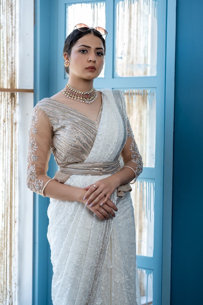 signature Christian bridal Off-white saree with lace work over georgette