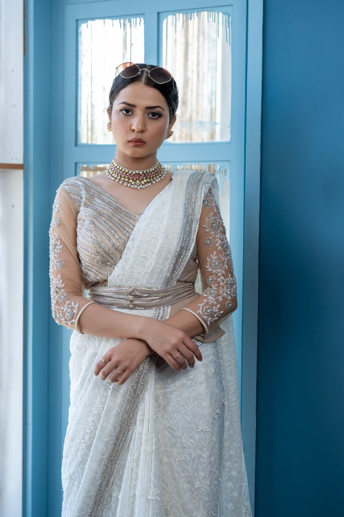 signature Christian bridal Off-white saree with lace work over georgette