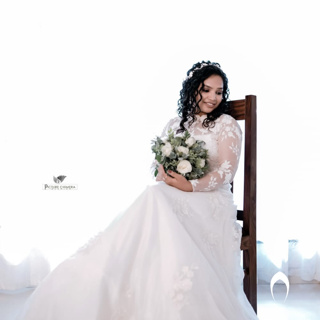 Signature  Christian bridal Tapered A Line Gown In Organza carried By Bride Shelmy