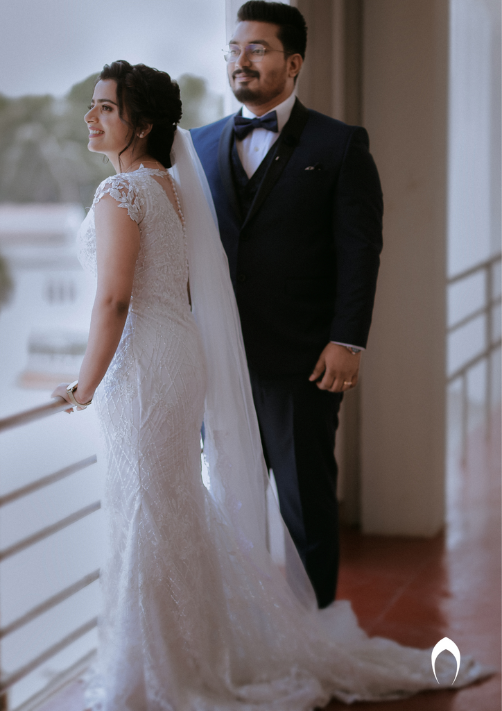 Signature christian bridal mermaid A-line gown in net carried by bride Diya
