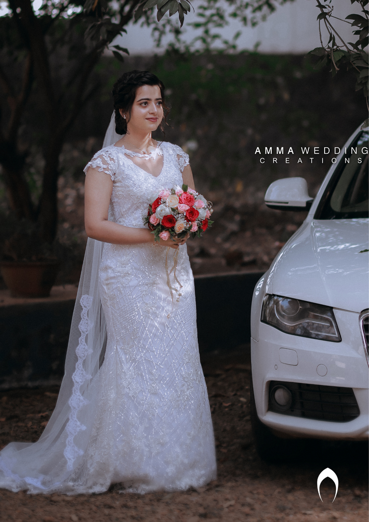 Signature christian bridal mermaid A-line gown in net carried by bride Diya