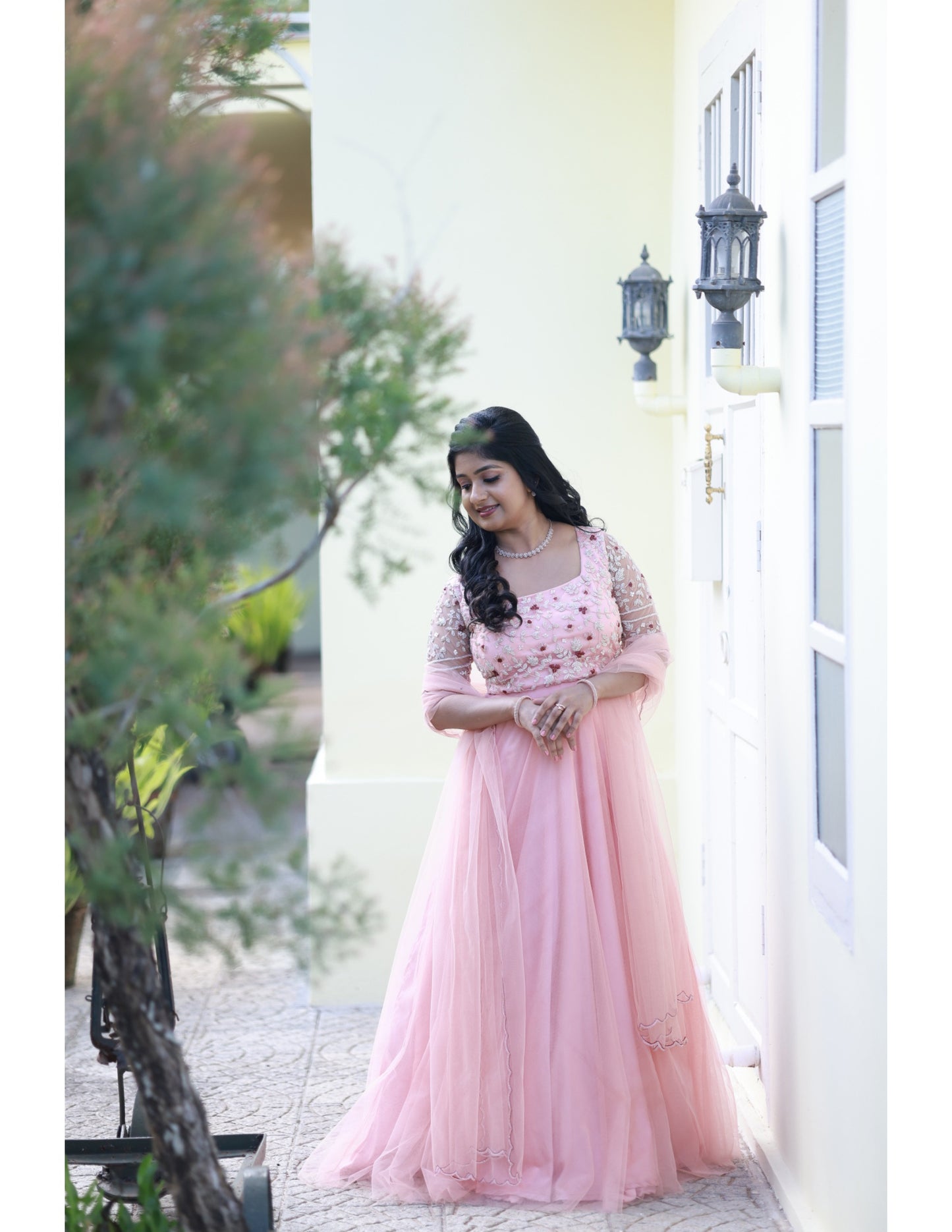 Signature bridal pink net lehanga with hand worked blouse