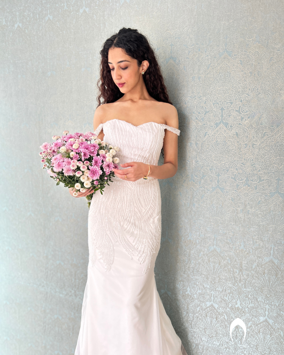 Signature christian bridal mermaid off shoulder gown with embellished net