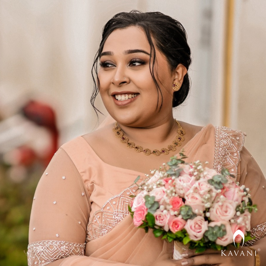 Our beautiful bride in her stunning hand embroidered pastel peach shade saree