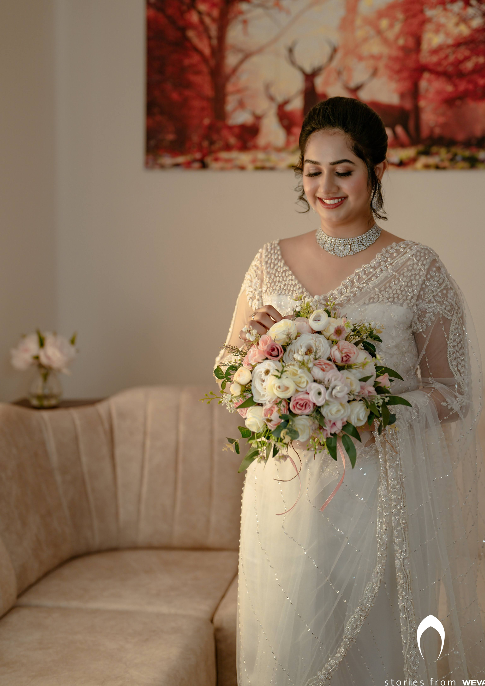 Bride in store white saree