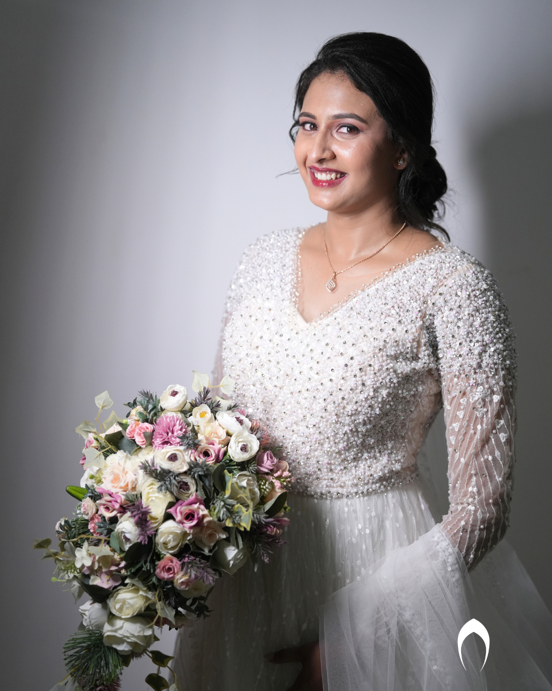 Signature christian bridal Aline gown featuring intricate handwork with beads and pearls
