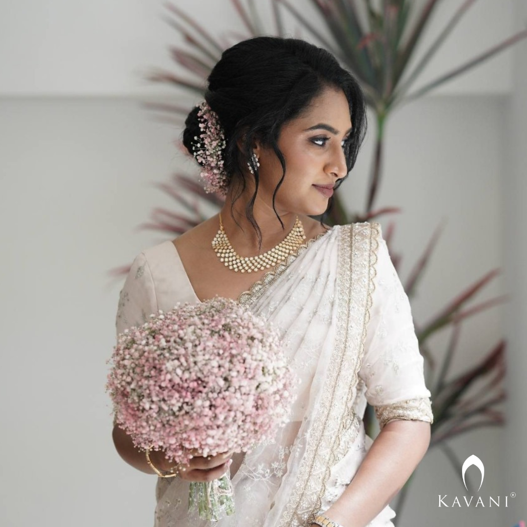 Our beautiful bride showing her elegance of her bridal outlook with beautiful bridal organza saree  with complete thread embroidery and enhancing hand embroidery work