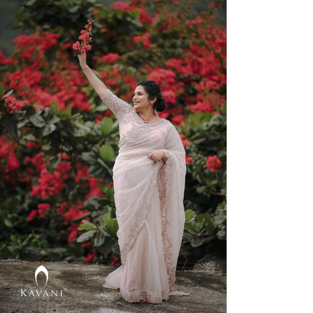 Our beautiful bride in her pretty bridal pastel saree with beautiful hand embroidery