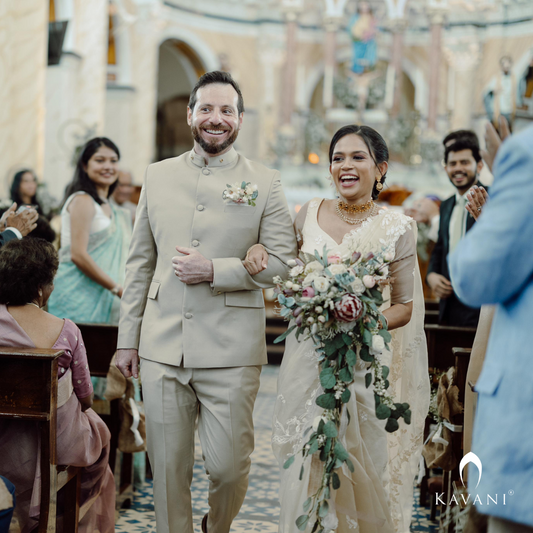 Our beautiful bride in her bridal pastel saree with lace embroidery with long trailing