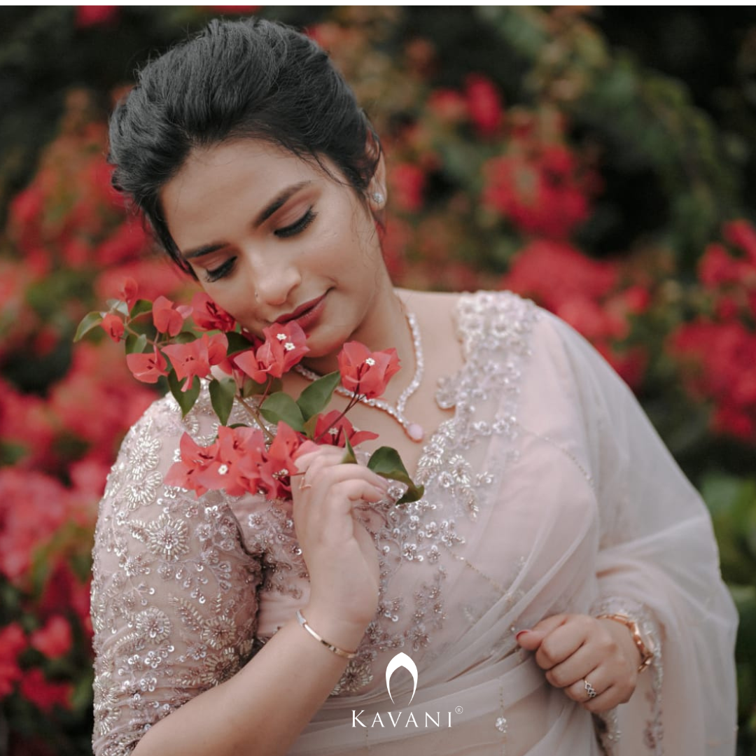 Our beautiful bride in her pretty bridal pastel saree with beautiful hand embroidery