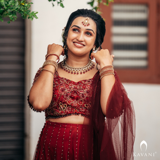 Our beautiful bride in her beautiful and elegant dark reddish lehenga with beautiful hand embroidery