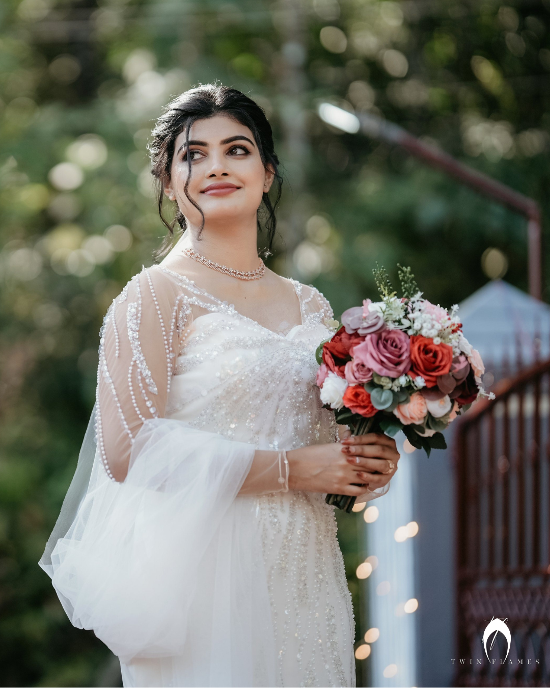 Signature bridal fish cut gown in embellished net with full sleeve