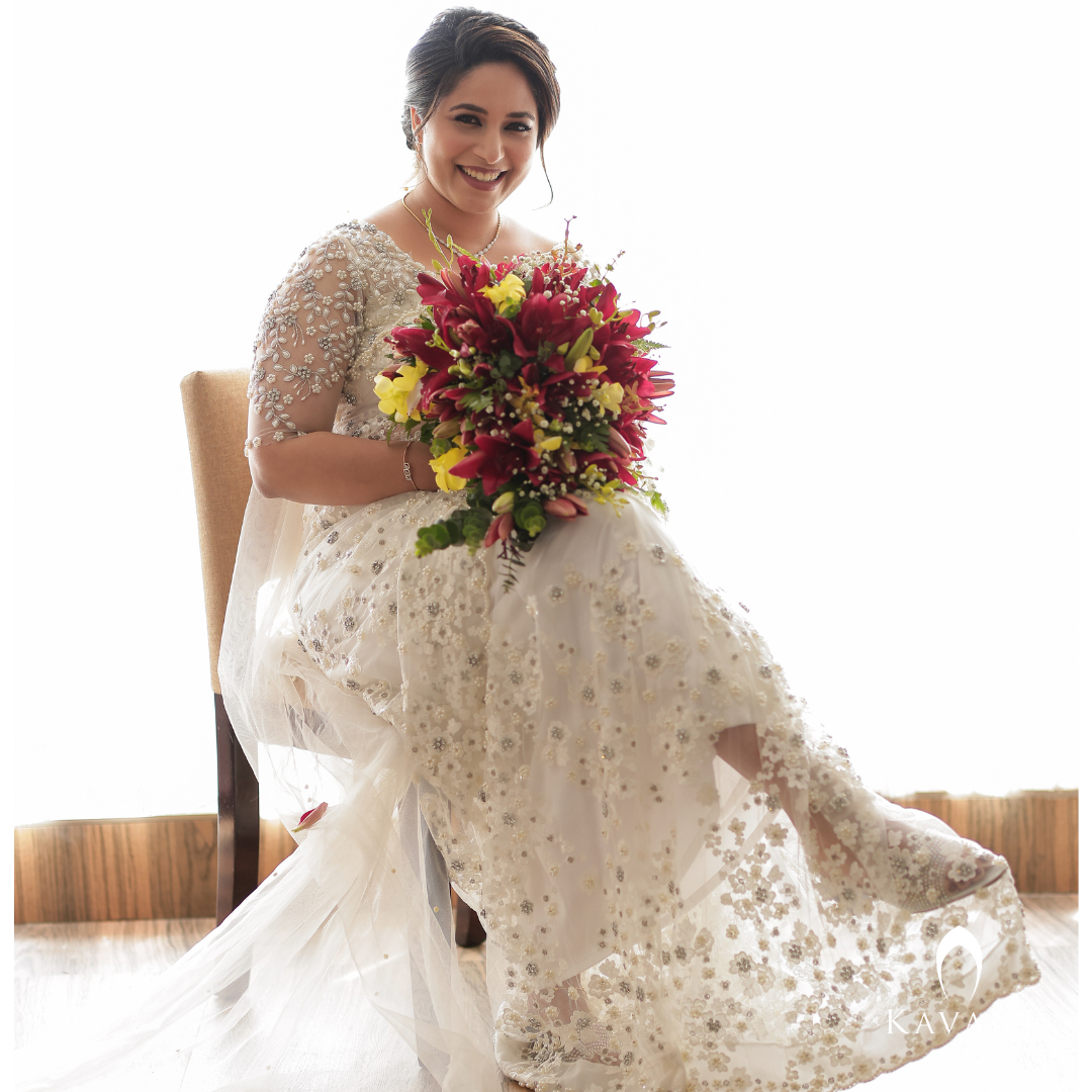 Our pretty bride in her stunning bridal saree with fully hand embroidered