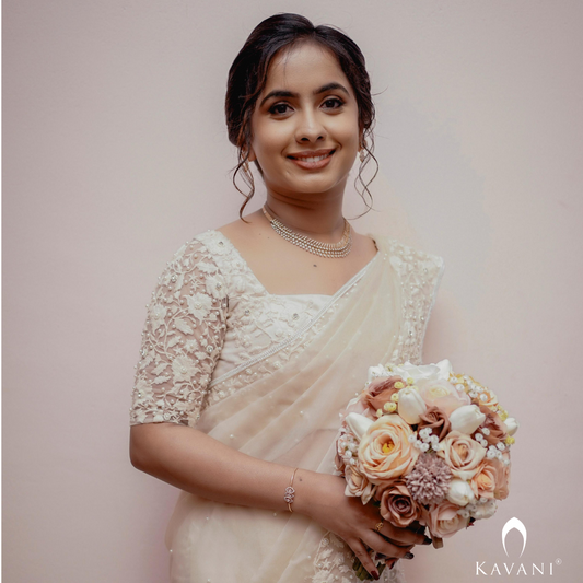 Our beautiful  bride in her stunning look in off white saree with beautiful and elegant looking lace embroidery