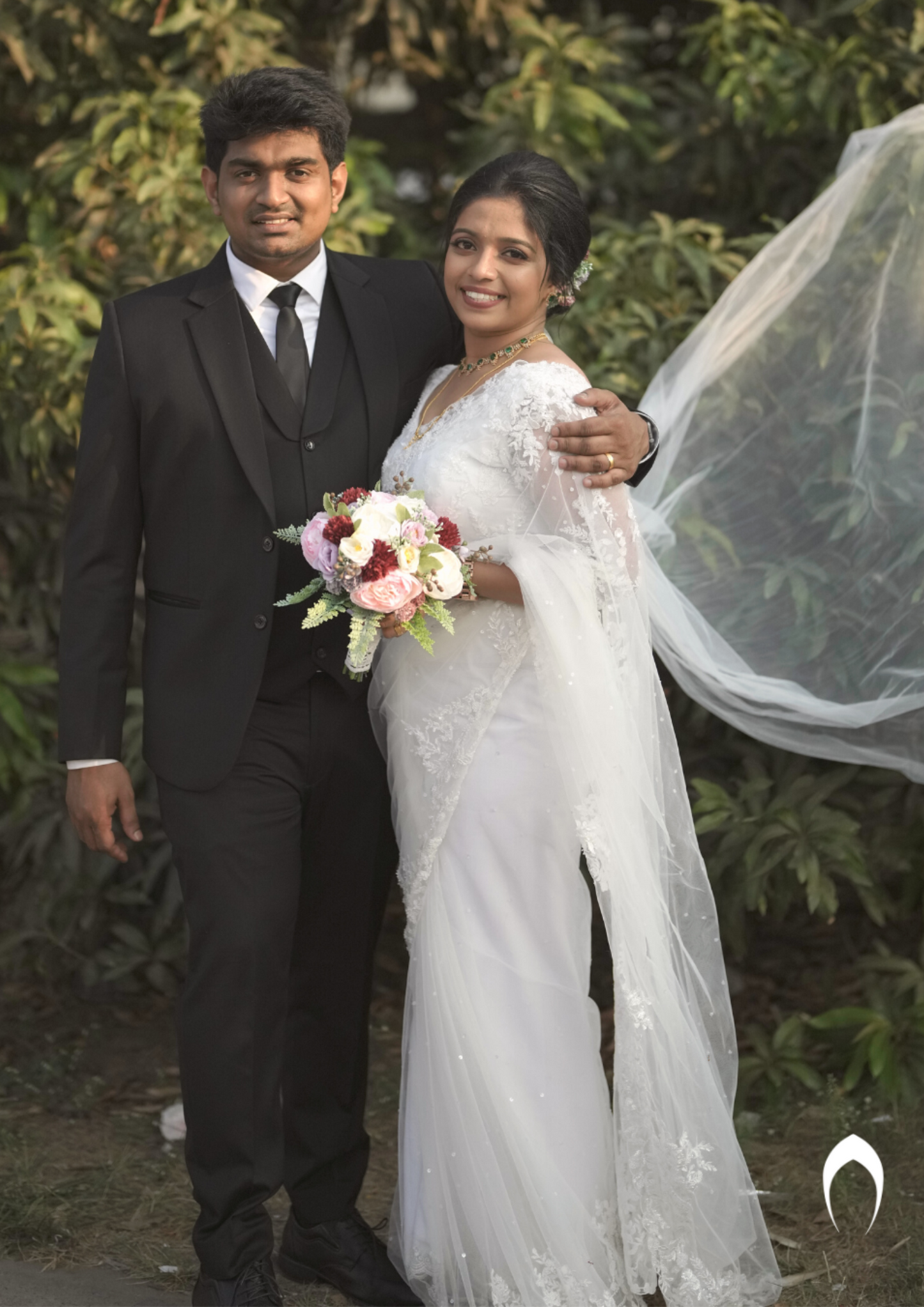 Signature Christian white bridal saree with embellished lace embroidery