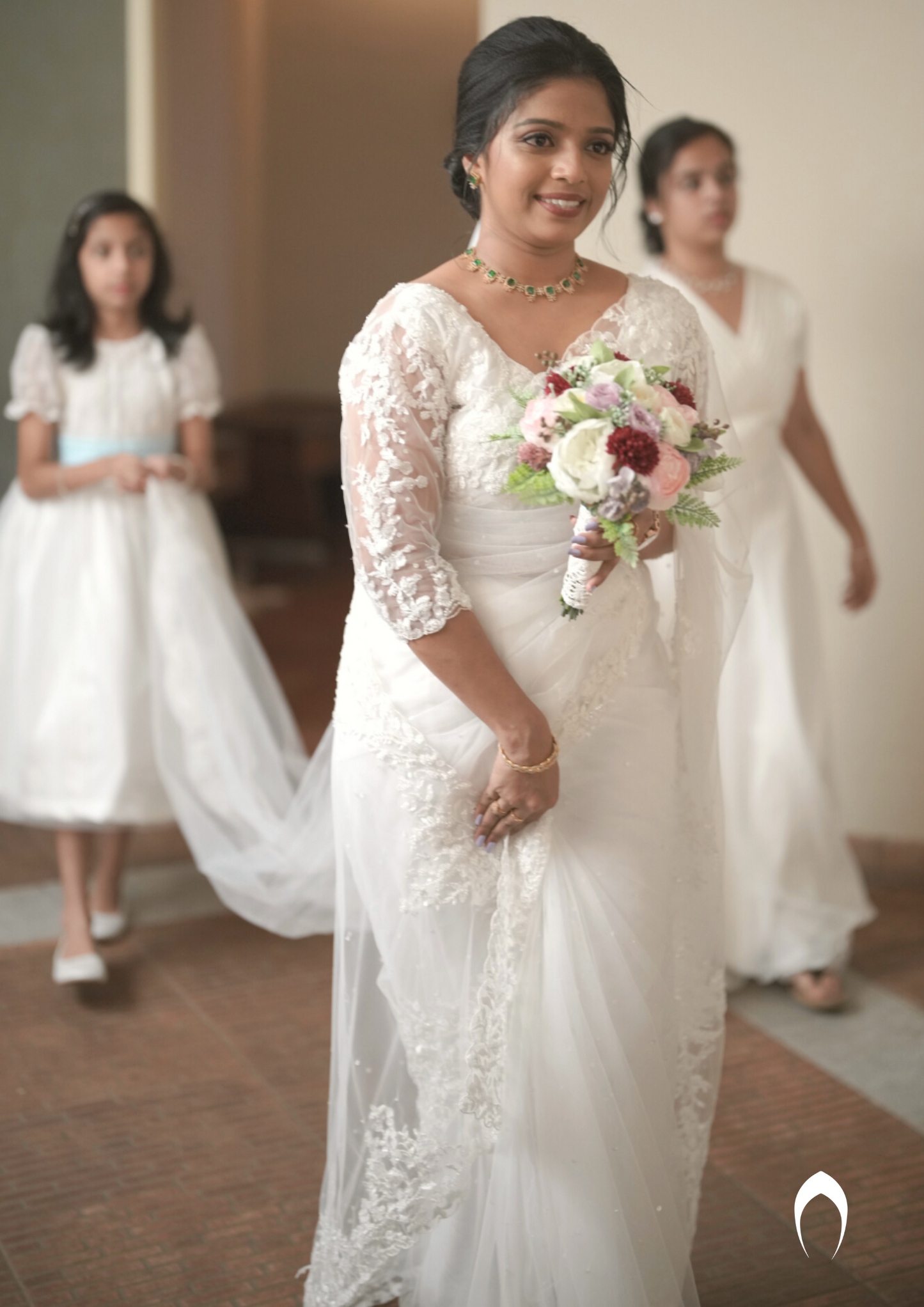 Signature Christian white bridal saree with embellished lace embroidery