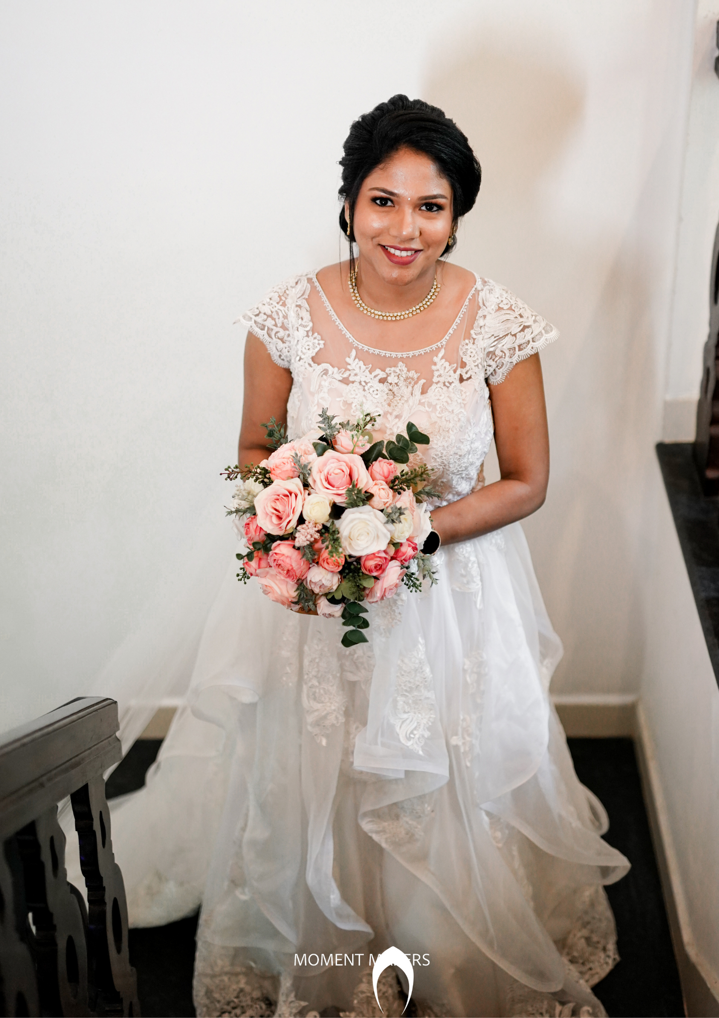 Signature Christian bridal  ruffled  gown carried by bride Jacqueline