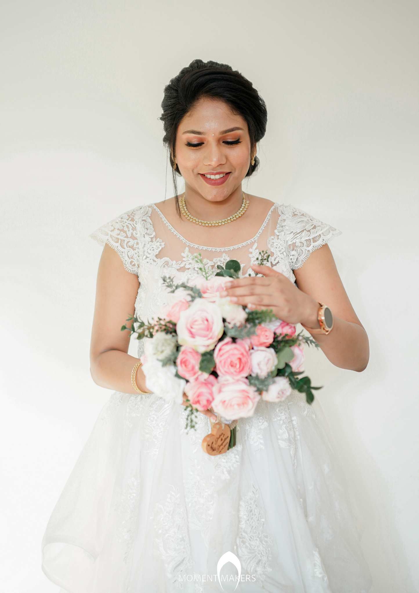 Signature Christian bridal  ruffled  gown carried by bride Jacqueline