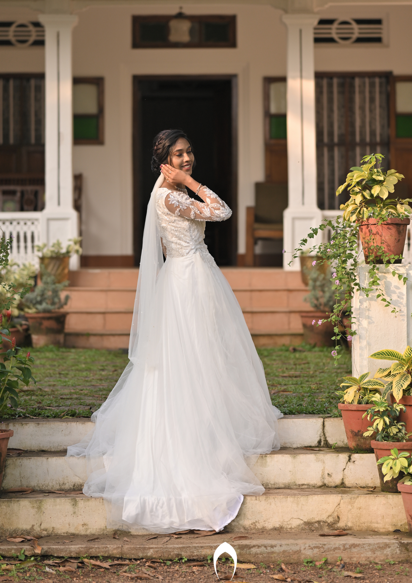 Signature Christian bridal  A-line  gown carried by bride Tanny