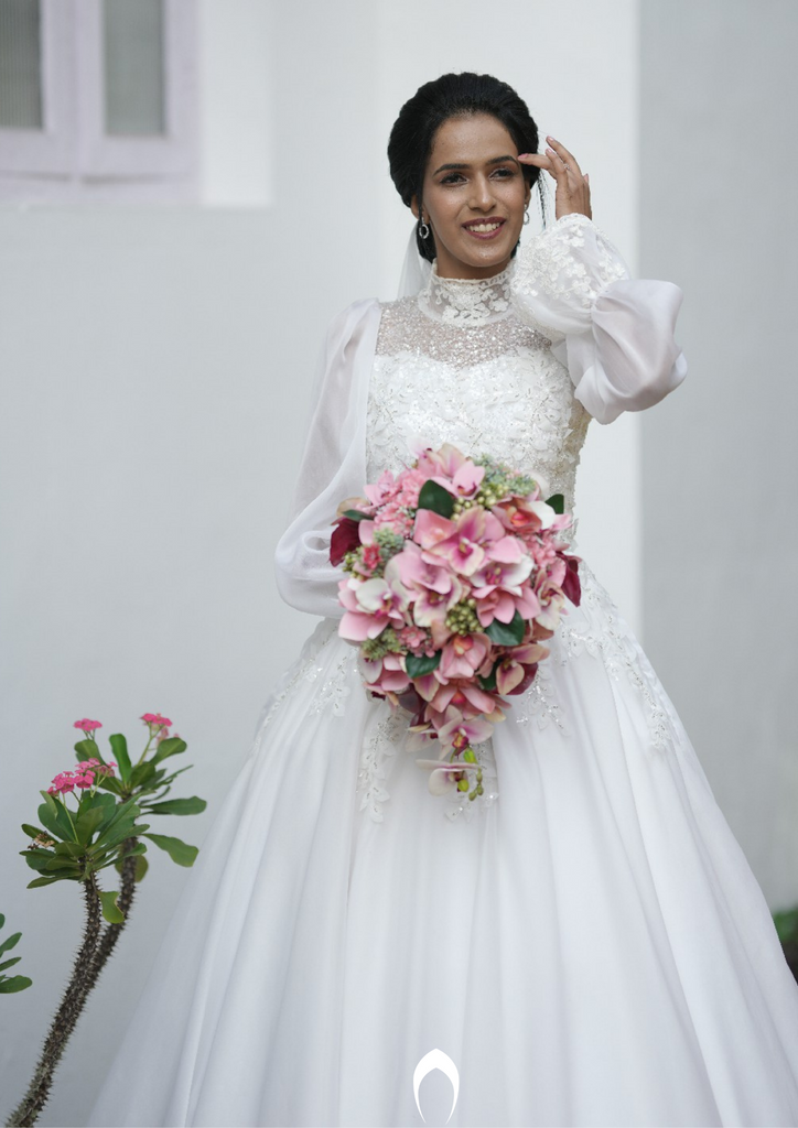 Signature Christian bridal A-line statement gown carried by bride Maria