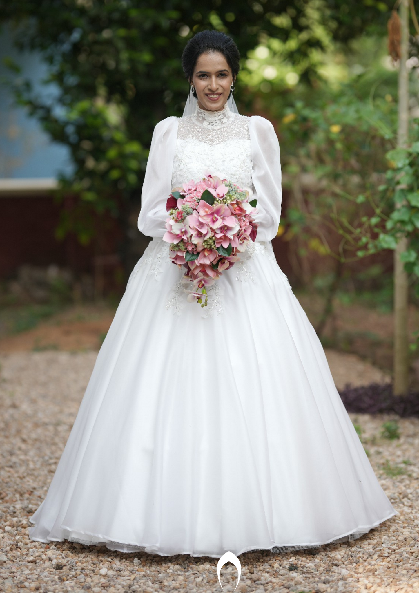 Signature Christian bridal A-line statement gown carried by bride Maria