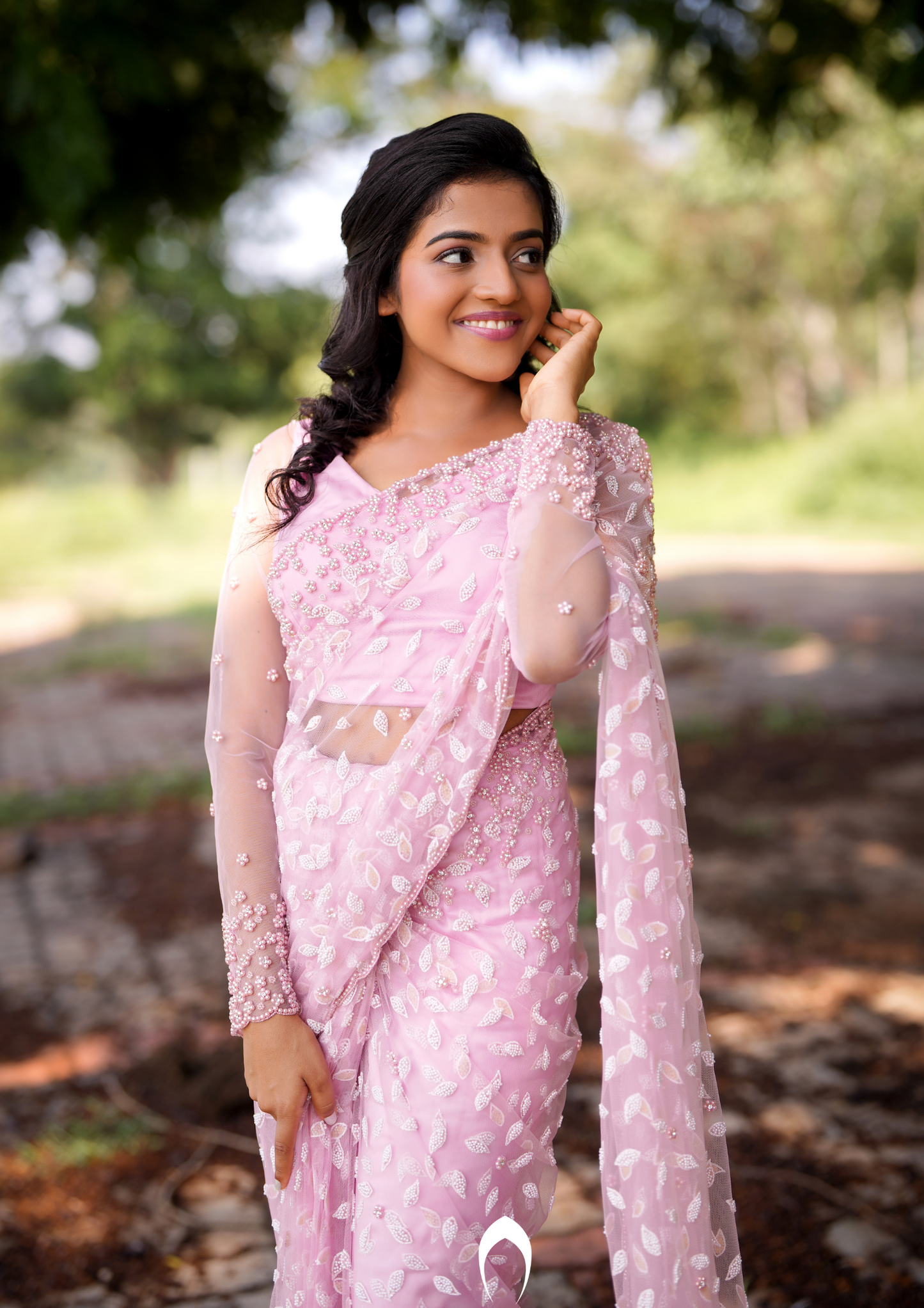 Signature Christian bridal saree in pink embellished net