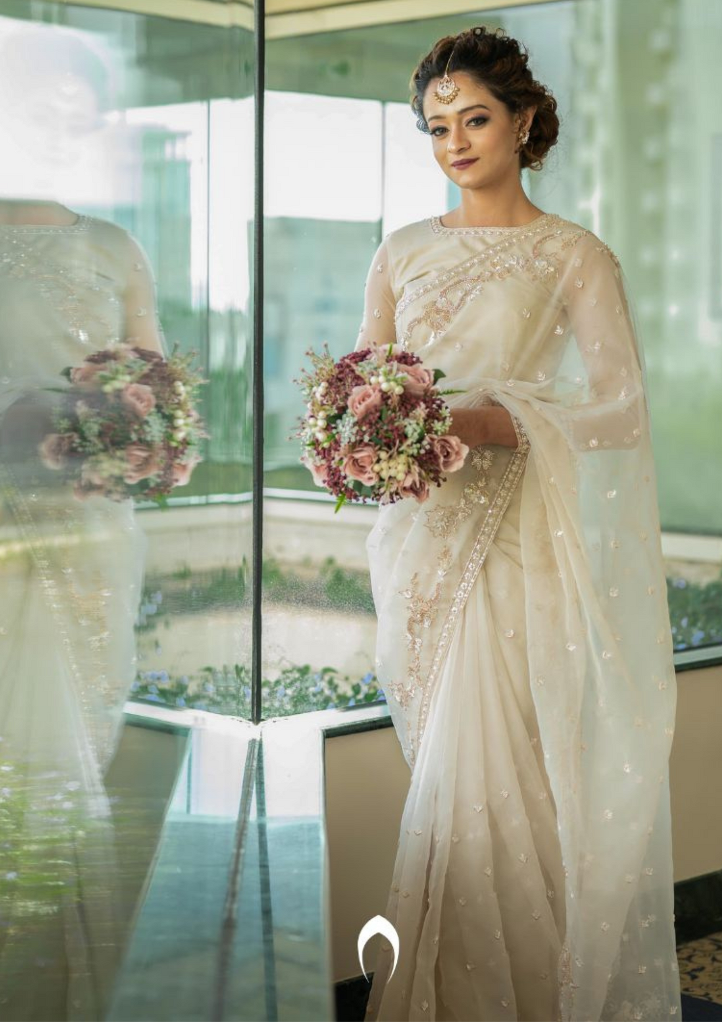 Signature Christian bridal saree in rosegold with heavy hand embroidery