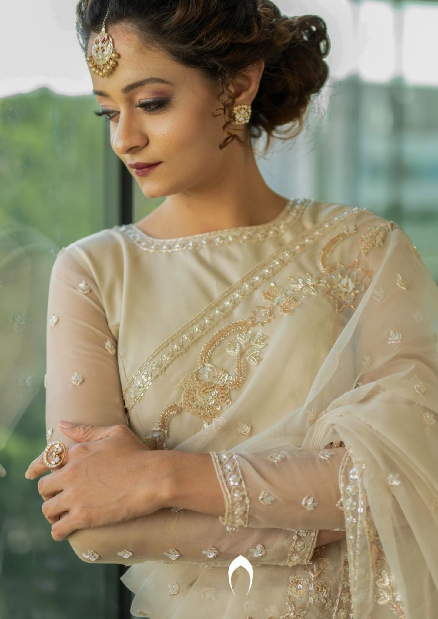 Signature Christian bridal saree in rosegold with heavy hand embroidery