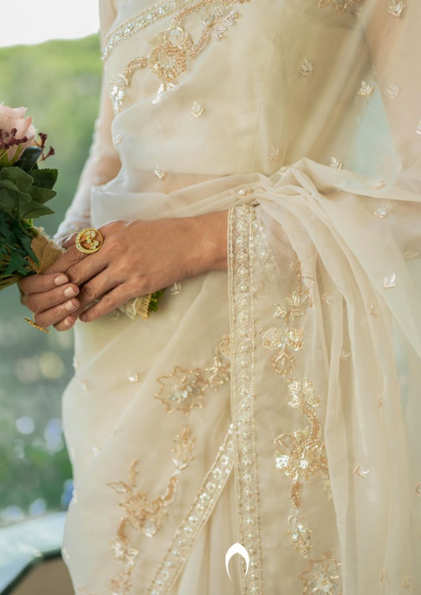 Signature Christian bridal saree in rosegold with heavy hand embroidery