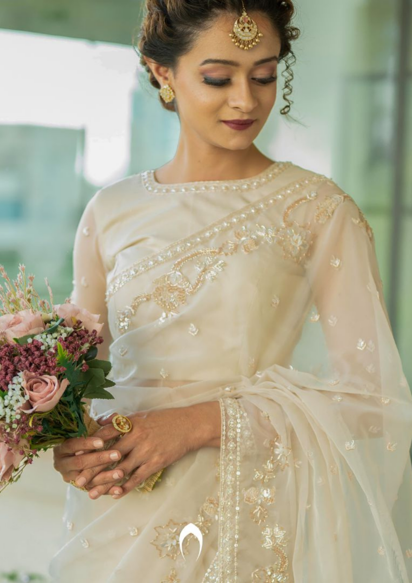 Signature Christian bridal saree in rosegold with heavy hand embroidery